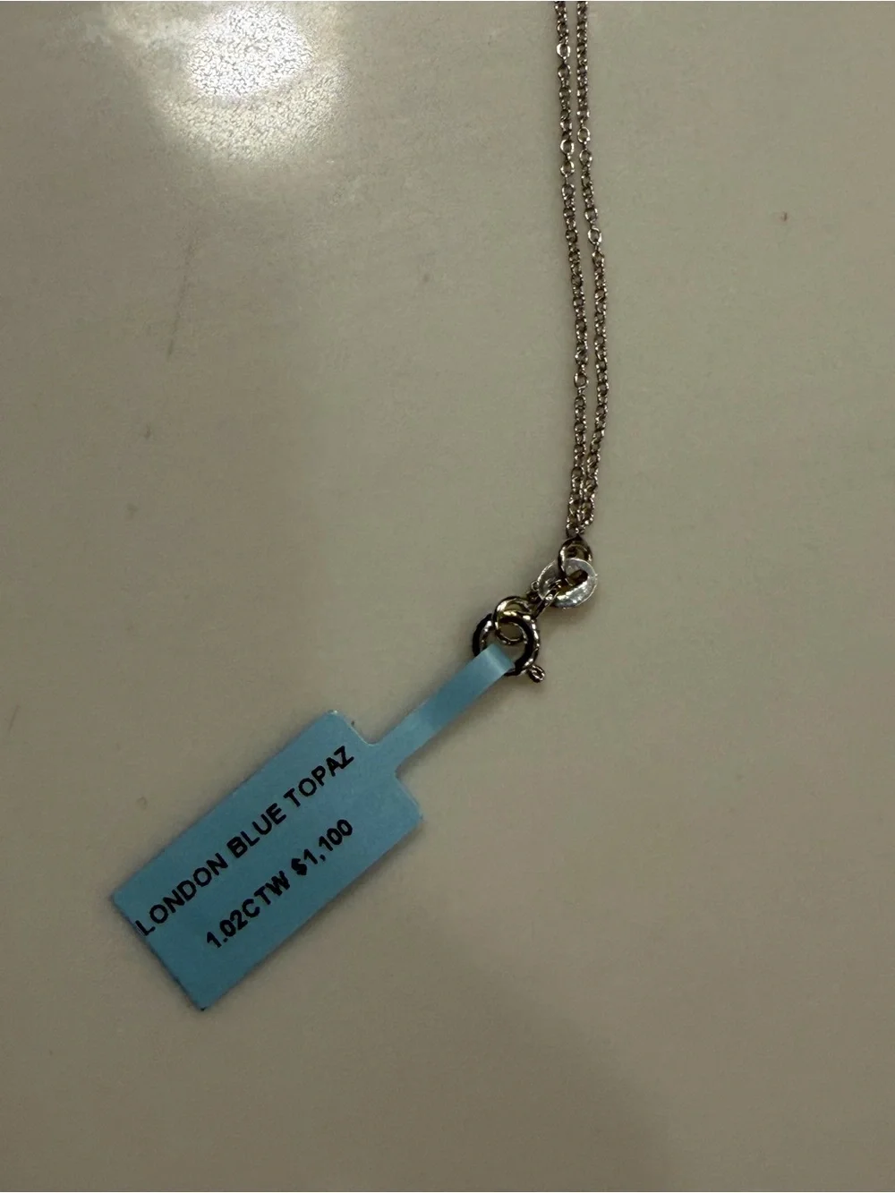 Sterling Silver Cross Pendant Necklace in London Blue Topez 9 inches long